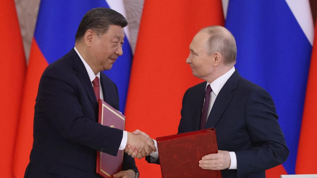 Xi, Putin Pledge to Stand Together Against the US