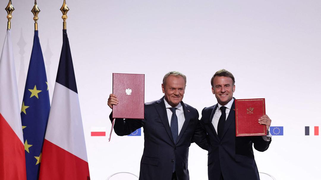 France, Poland Sign Treaty With Mutual Defense Clause